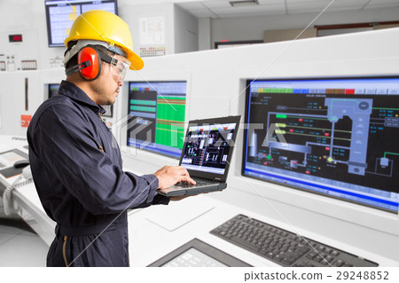 Electrical engineer working at control room 29248852