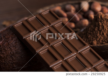 Cocoa pod and chocolate bar and food dessert Cocoa pod and chocolate bar and food dessert 29250925