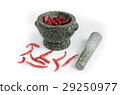 dried chili with mortar on white backgro 29250977