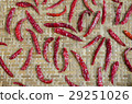 spicy chili on bamboo background 29251026