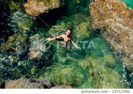girl in the sea lagoon aerial top view girl in the sea lagoon aerial top view 29252990