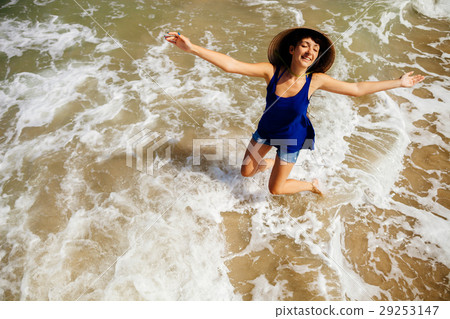 girl in vietnamese hat on the beach top view girl in vietnamese hat on the beach top view 29253147