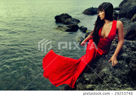 lady in red dress in the water 29253748