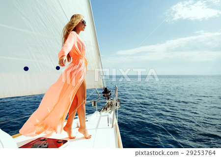 luxury woman pareo yachting in sea  29253764