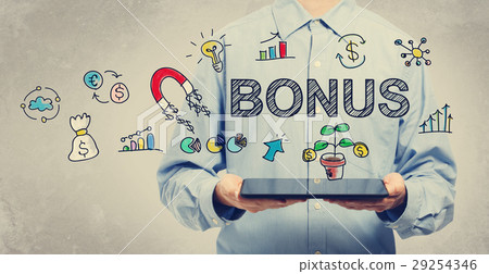 Bonus concept with young man holding a tablet 29254346