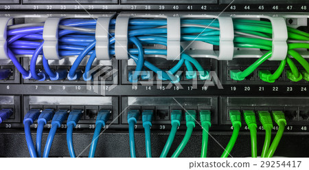 Server rack with blue internet patch cord cables 29254417