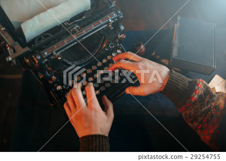 Male hands typing on retro typewriter Male hands typing on retro typewriter 29254755