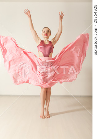 Young girl dancing in beautiful pink dress 29254929