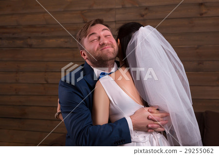 Happy newlyweds embracing after marriage proposal Happy newlyweds embracing after marriage proposal 29255062