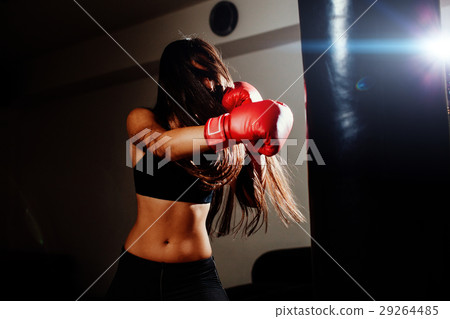 sexy fighter girl punching actively 29264485