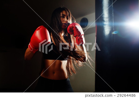 sexy fighter girl punching actively 29264486