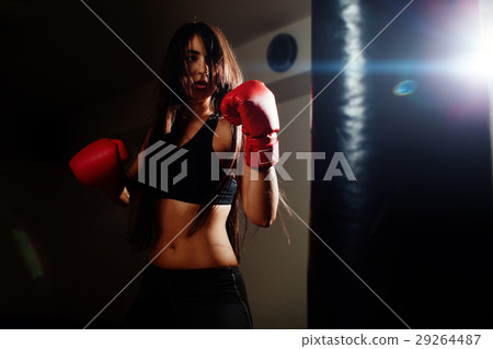 sexy fighter girl punching actively 29264487