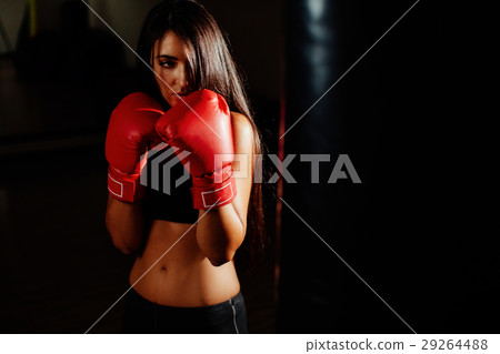 sexy fighter girl punching actively 29264488