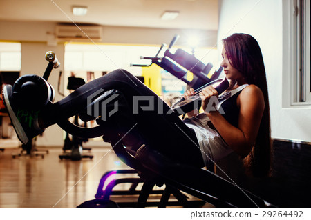 sexy fitness woman abs work out in gym 29264492