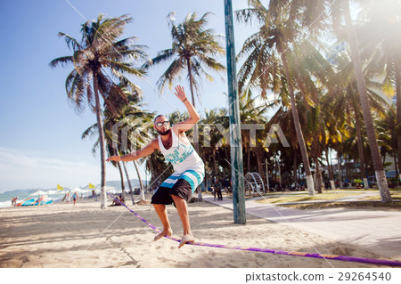 teenager balancing on slackline teenager balancing on slackline 29264540