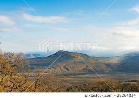 Panoramic view on faraway mountains in fall season 29264834