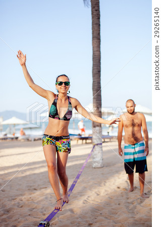 teenage girl balancing on slackline teenage girl balancing on slackline 29265140