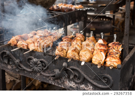 Barbecue with delicious grilled meat on grill 29267358