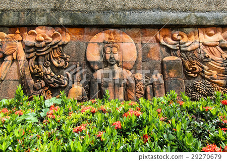 Thai sculpture in public park Buddha on wall 29270679