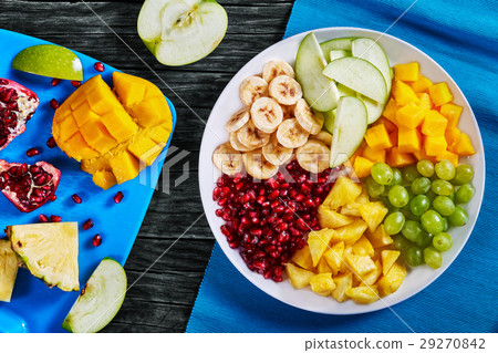 delicious colorful fruit salad set, top view 29270842