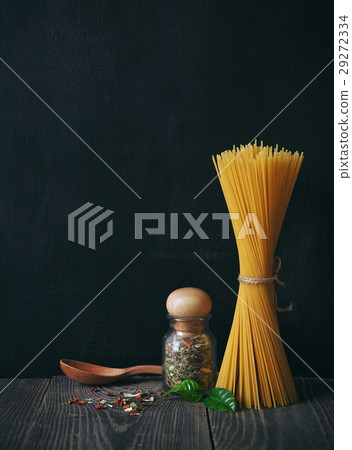spaghetti and spices on blackboard background 29272334
