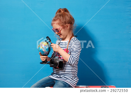 Child blonde girl with pink vintage suitcase study 29272550