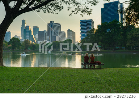 Two Young woman traveler sitting on chair Two Young woman traveler sitting on chair 29273236