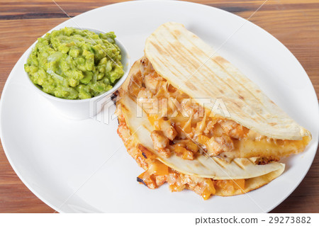 Quesadilla with guacamole sauce 29273882