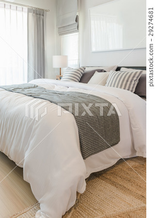 set of pillows and blanket on bed  29274681