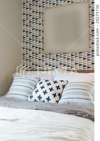 black and white pillows color set on bed  29274736