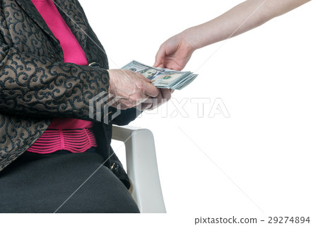 Child gives money to a grandmother 29274894