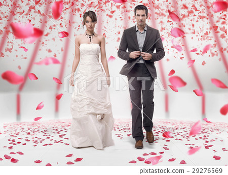 Attractive newlyweds in the room full of petals Attractive newlyweds in the room full of petals 29276569