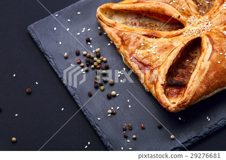 Home made, puff pastry with meat and spices on the 29276681