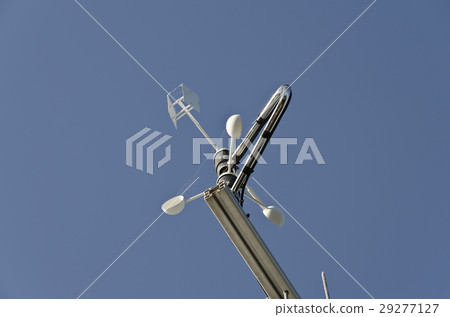 Anemometer or wind vane on a blue sky Anemometer or wind vane on a blue sky 29277127