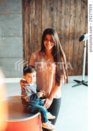 Mother and young son posing at hone Mother and young son posing at hone 29277959