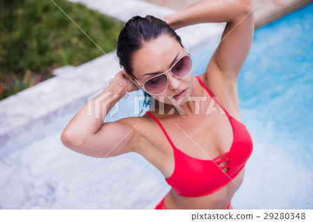 Fashion outdoor portrait of pretty sexy brunette 29280348