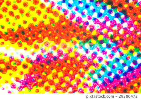 Four color printing on plastic under microscope Four color printing on plastic under microscope 29280472