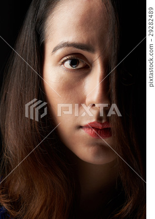 close up of woman face covered with hair close up of woman face covered with hair 29282489