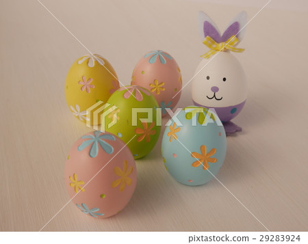 Colorful Easter eggs on a white wooden background 29283924
