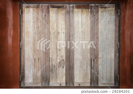 abstract close up old wood window on brown wall abstract close up old wood window on brown wall 29284201