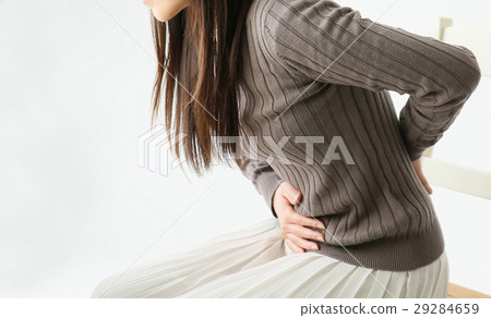 A woman hurting tummy A woman hurting tummy 29284659