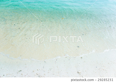 white sand with blue green waves on the beach 29285231