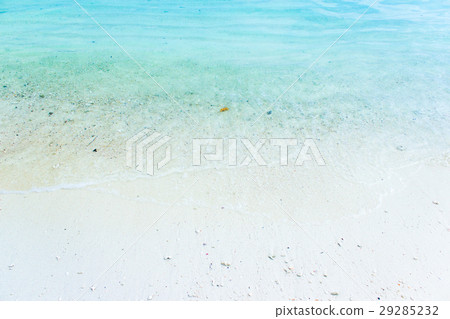 white sand with blue green waves on the beach 29285232