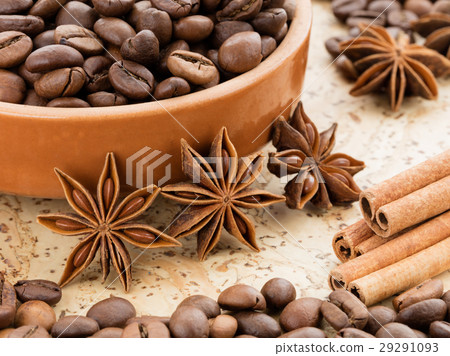 Coffee beans on the plate. Cinnamon and anise. Coffee beans on the plate. Cinnamon and anise. 29291093