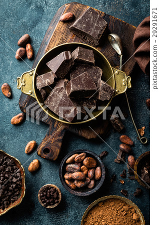Dark chocolate pieces crushed and cocoa beans 29291671