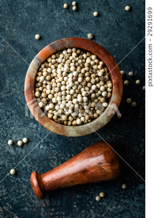 White pepper on dark background directly above 29291699