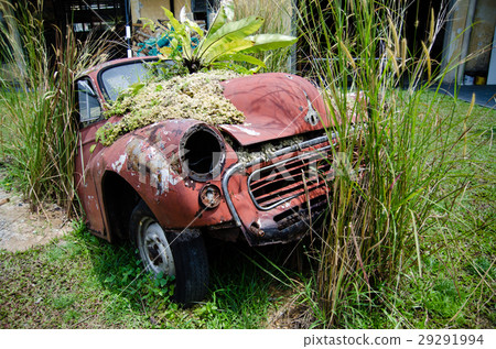 Abandoned old rusty car. Retro background Abandoned old rusty car. Retro background 29291994