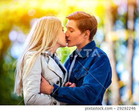 Spring couple walking park. Summer friends walk Spring couple walking park. Summer friends walk 29292246