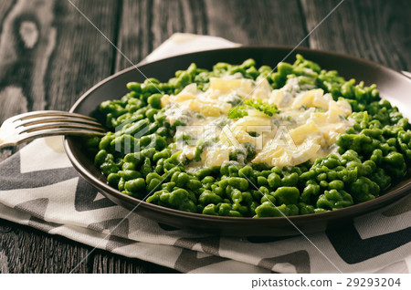 German dumplings (spaetzle) with spinach,cheese. German dumplings (spaetzle) with spinach,cheese. 29293204