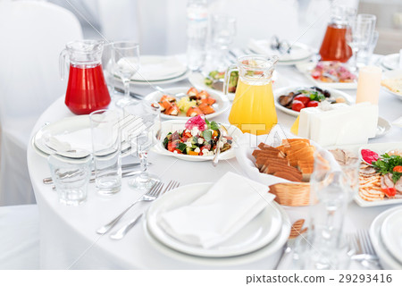 Restaurant table with food. Tasty appetizers 29293416
